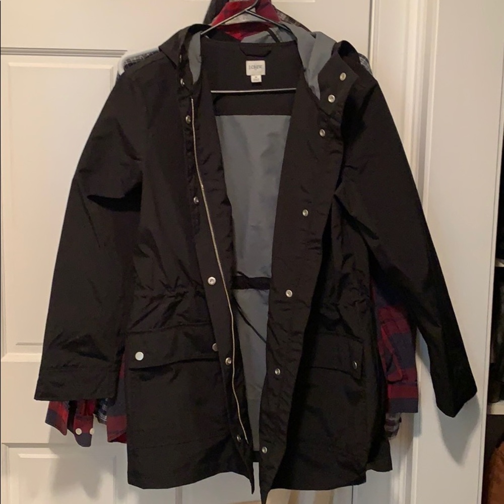 Black hooded light rain jacket
